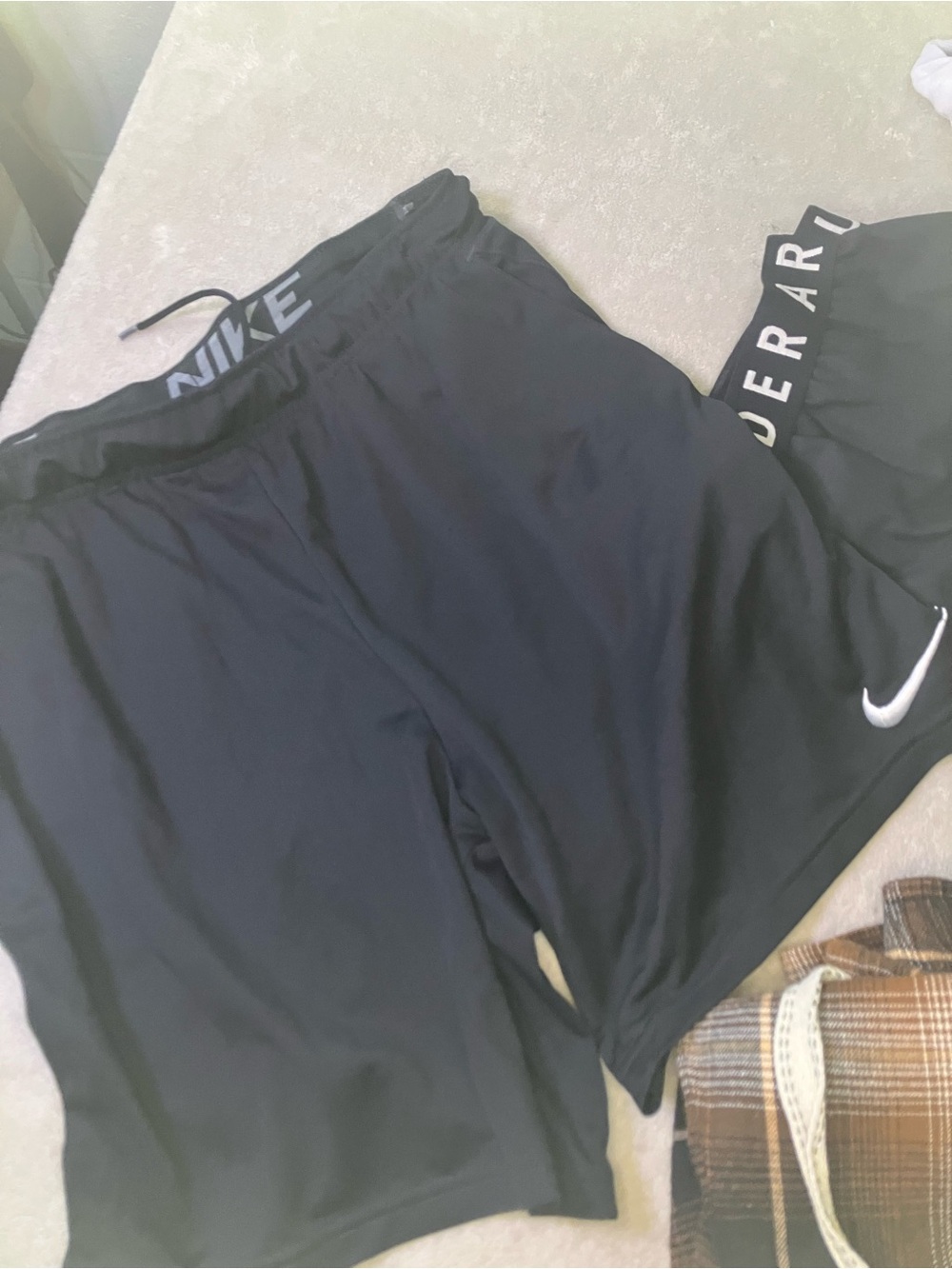 Women’s lot 2 athletic shorts Nike Black Athletic Shorts Under Armour Size L